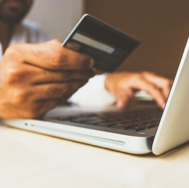 Person holiday shopping online.